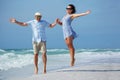 Young couple having fun at tropical beach, Siesta Royalty Free Stock Photo