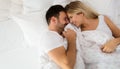 Young couple having having romantic times in bedroom Royalty Free Stock Photo