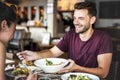 Young couple having lunch in a restaurant Royalty Free Stock Photo