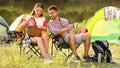 Young couple having picnic near tent Royalty Free Stock Photo