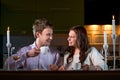 Young couple having romantic dinner on the dinner table at home Royalty Free Stock Photo