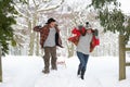 Young couple having snowball fight Royalty Free Stock Photo