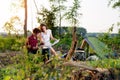 Couple hikers in the mountains, they is looking at map Royalty Free Stock Photo