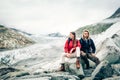 Young Couple Hiking In The Swiss Alps, Taking A Break Royalty Free Stock Photo