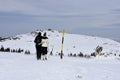 Young couple in mountain, severe winter weather with wind gusts, Vitosha Mountain, Bulgaria Royalty Free Stock Photo