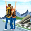 Young couple of hitchhikers standing on road and enjoying mountain scenery Royalty Free Stock Photo