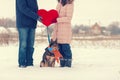 Young couple holding big red heart Royalty Free Stock Photo