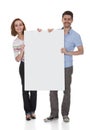 Young couple holding blank placard Royalty Free Stock Photo