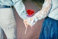 Young couple holding hands. man and woman hold a sign of love heart Royalty Free Stock Photo