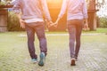 A young couple holding hands. In Nature sunrise Royalty Free Stock Photo