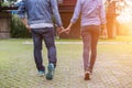 A young couple holding hands. In Nature sunrise Royalty Free Stock Photo