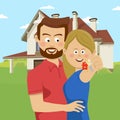 Young couple holding keys of their new house. Happy family moving into new home. Royalty Free Stock Photo