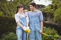 Young couple holding shovel and spading fork Royalty Free Stock Photo