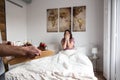 young couple at home with breakfast in bed suprise Royalty Free Stock Photo