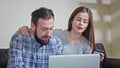 Young Couple at Home Buying on Internet Royalty Free Stock Photo