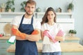 Young couple at home doing hosehold chores Royalty Free Stock Photo