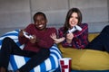 Young Couple at home Playing Video Game Together Royalty Free Stock Photo