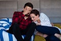 Young couple at home watching a movie with popcorn Royalty Free Stock Photo