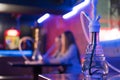 Young couple in a hookah bar. Royalty Free Stock Photo