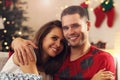 Young couple hugging in Christmas time Royalty Free Stock Photo