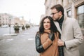 Young couple hugging on the city street in winter Royalty Free Stock Photo