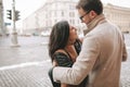 Young couple hugging on the city street in winter Royalty Free Stock Photo