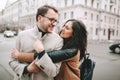 Young couple hugging on the city street in winter Royalty Free Stock Photo