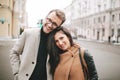 Young couple hugging on the city street in winter Royalty Free Stock Photo