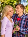 Young couple hugging and flirting in park. Royalty Free Stock Photo