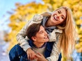 Young couple hugging and flirting in park. Royalty Free Stock Photo