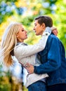 Young couple hugging and flirting in park Royalty Free Stock Photo