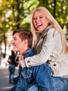 Young couple hugging and flirting in spring park Royalty Free Stock Photo