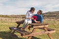 Young couple  Hugging, kissing and enjoying spending time together while celebrating Saint Valentine`s Day in the countryside. Royalty Free Stock Photo