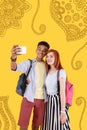 Young couple hugging and taking a selfie together Royalty Free Stock Photo