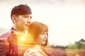 young couple hugging and watching sunset Royalty Free Stock Photo