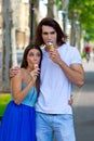 Young couple with ice creams Royalty Free Stock Photo