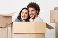 Young Couple Inside Cardboard Box