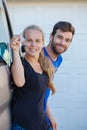 Young couple with keys to new car Royalty Free Stock Photo