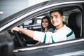 Young couple with keys to new car Royalty Free Stock Photo