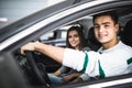 Young couple with keys to new car Royalty Free Stock Photo