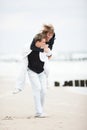 Young couple kissing on beach Royalty Free Stock Photo