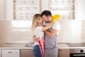 Young couple kissing after housework Royalty Free Stock Photo