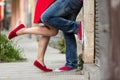 Young couple kissing outdoor. Male and female legs Royalty Free Stock Photo