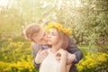 Young couple kissing outdoor in sunny day Royalty Free Stock Photo