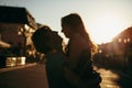 Young couple kissing over sunset Royalty Free Stock Photo