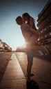 Young couple kissing over sunset Royalty Free Stock Photo