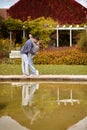 Young couple kissing and rejoices at the lake. lovely young couple kissing outdoors in autumn. Loving couple walking in Royalty Free Stock Photo