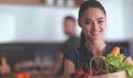 Young couple in the kitchen , woman with a bag of groceries shopping Royalty Free Stock Photo