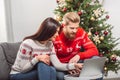 Couple using laptop at christmastime Royalty Free Stock Photo