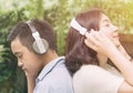 Young couple listening music form headphone Royalty Free Stock Photo